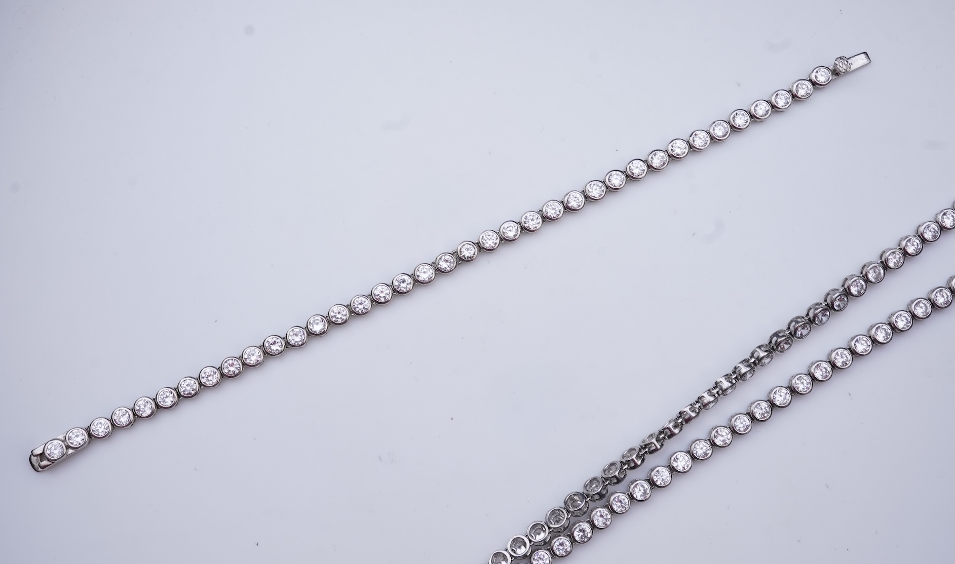 A cubic zirconia demi-parure